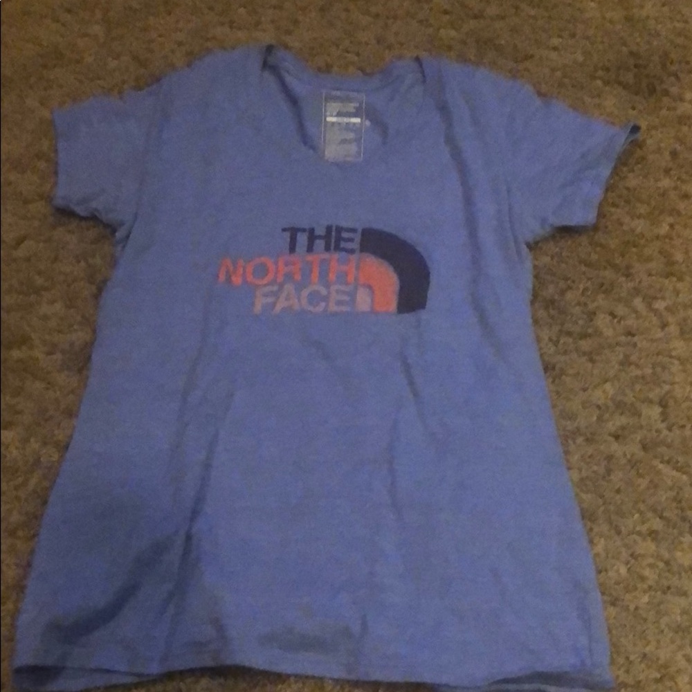 North face V neck color light blue
